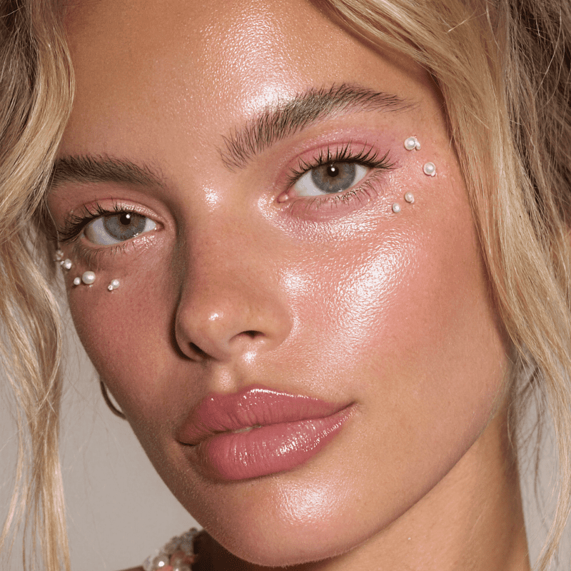 Close up of a woman's face to show her radiant skin and facial features